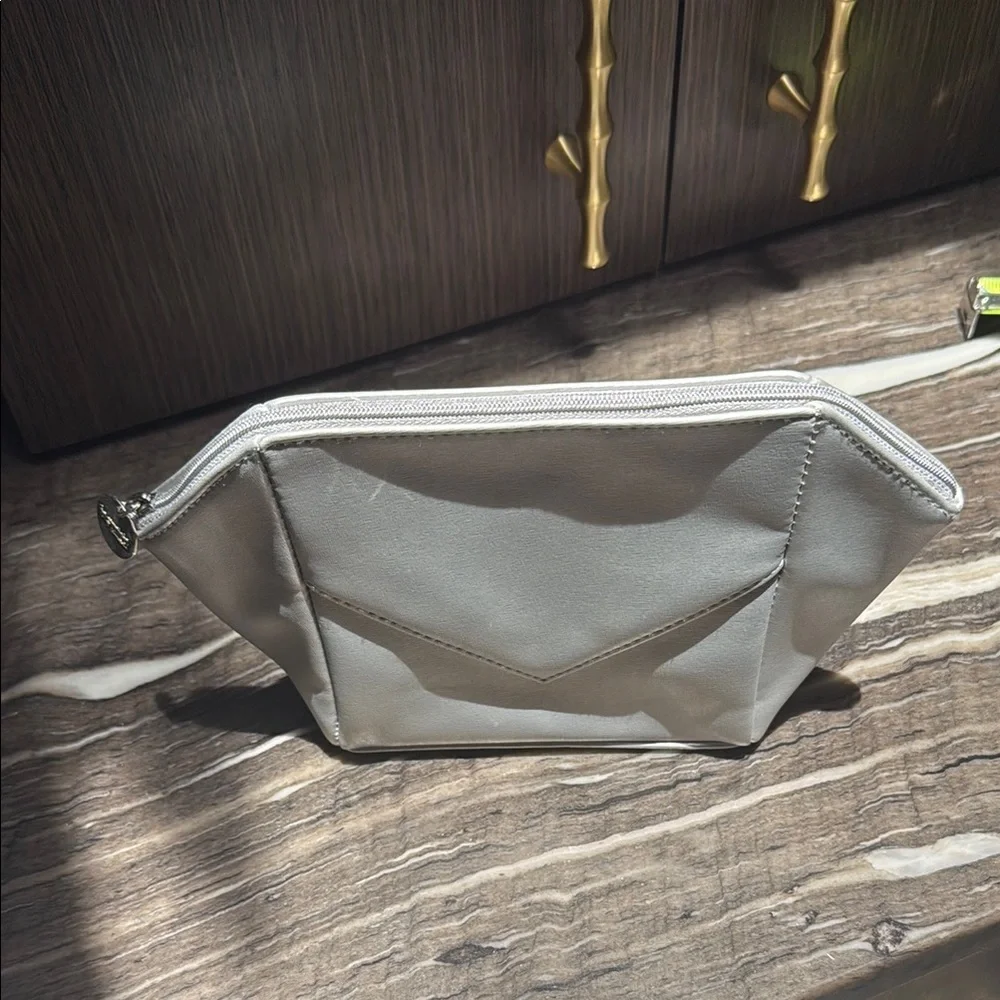 La Prairie Silver Cosmetic Bag with Geometric Design